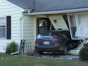 car into house